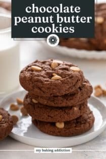 Four chocolate peanut butter cookies stacked on a white plate. Text overlay includes recipe name.