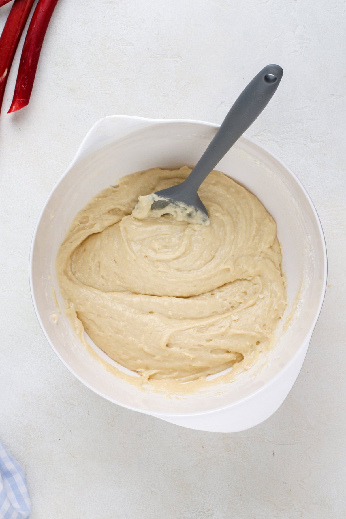 Cake batter in a white mixing bowl.
