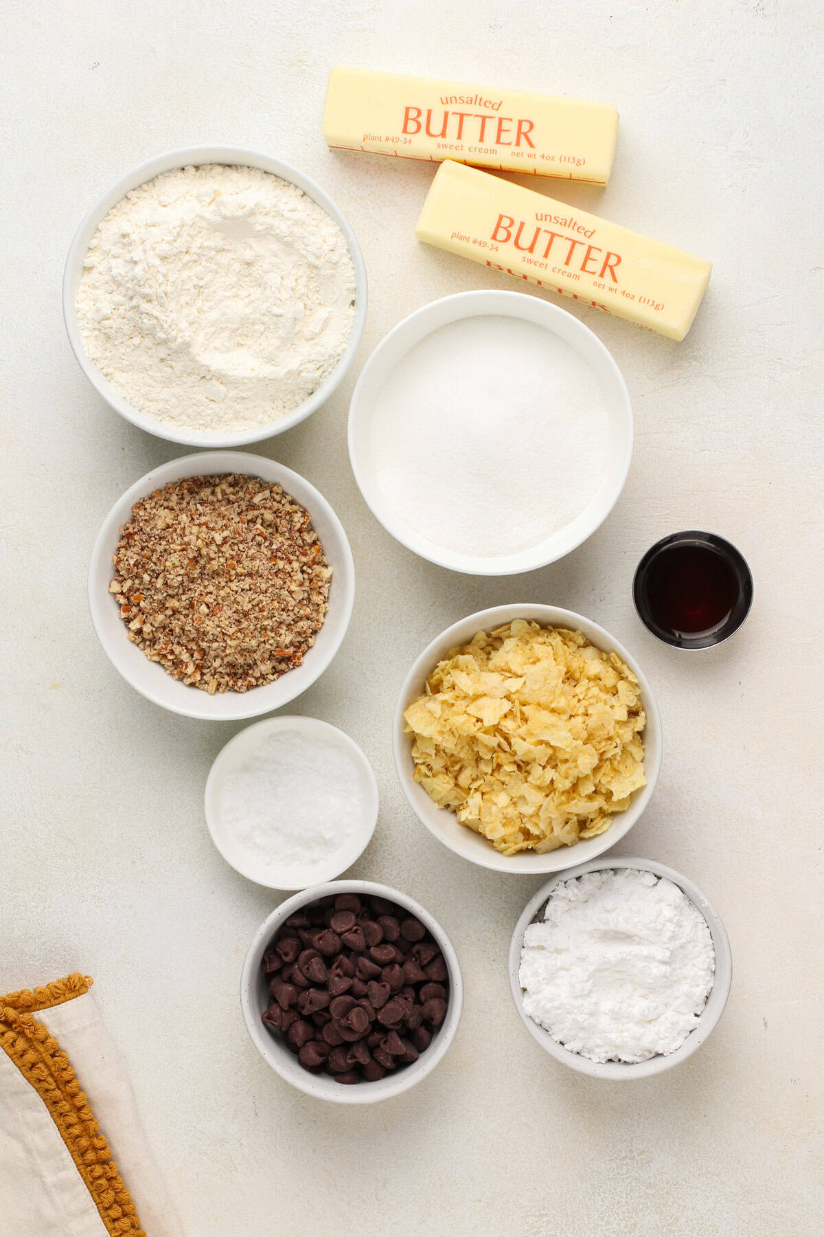 Ingredients for potato chip cookies arranged on a countertop.