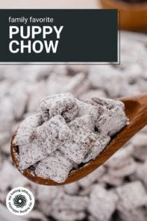 Wooden spoon holding up puppy chow to the camera. Text overlay includes recipe name.