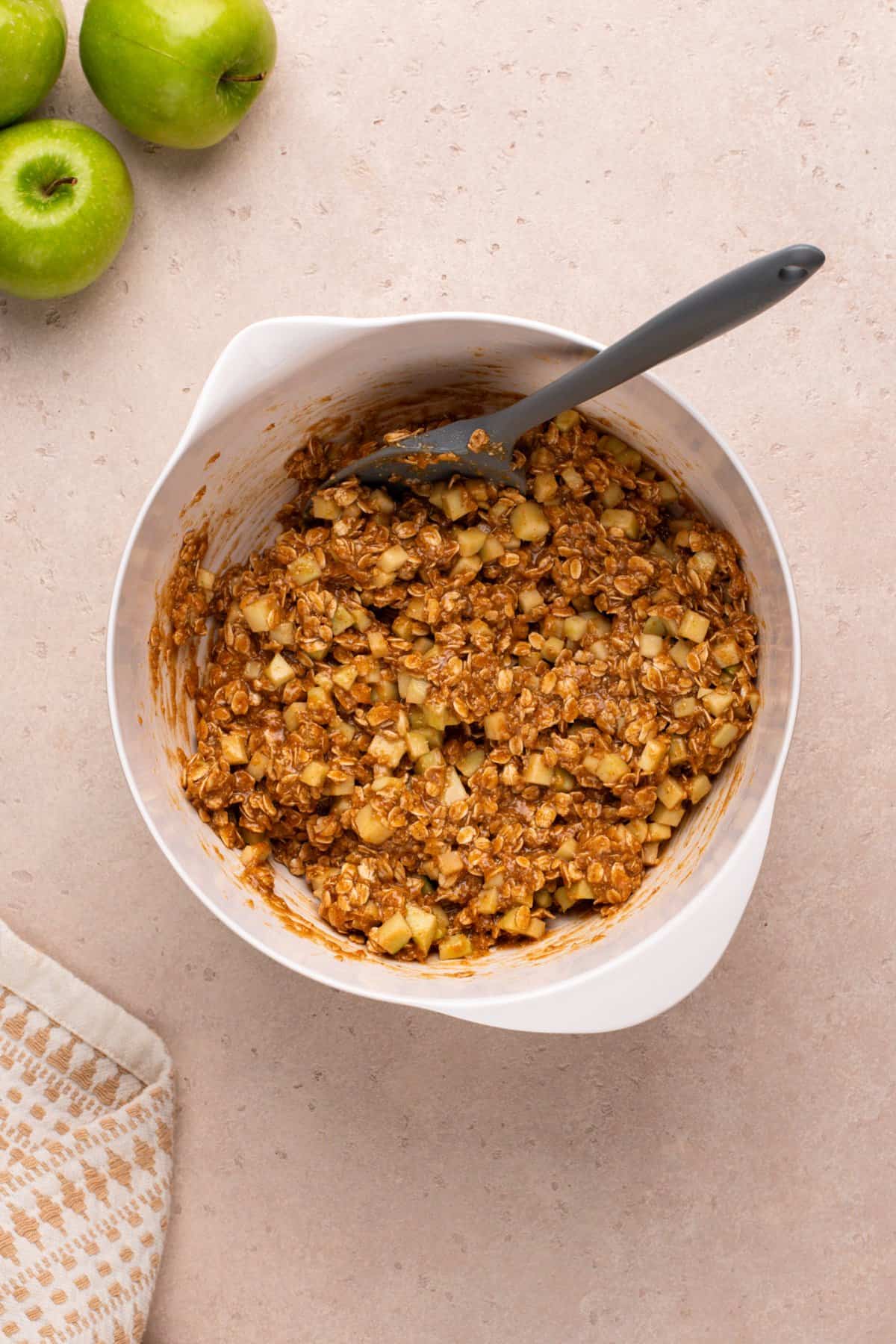 Apple spice cookie dough mixed in a white bowl.
