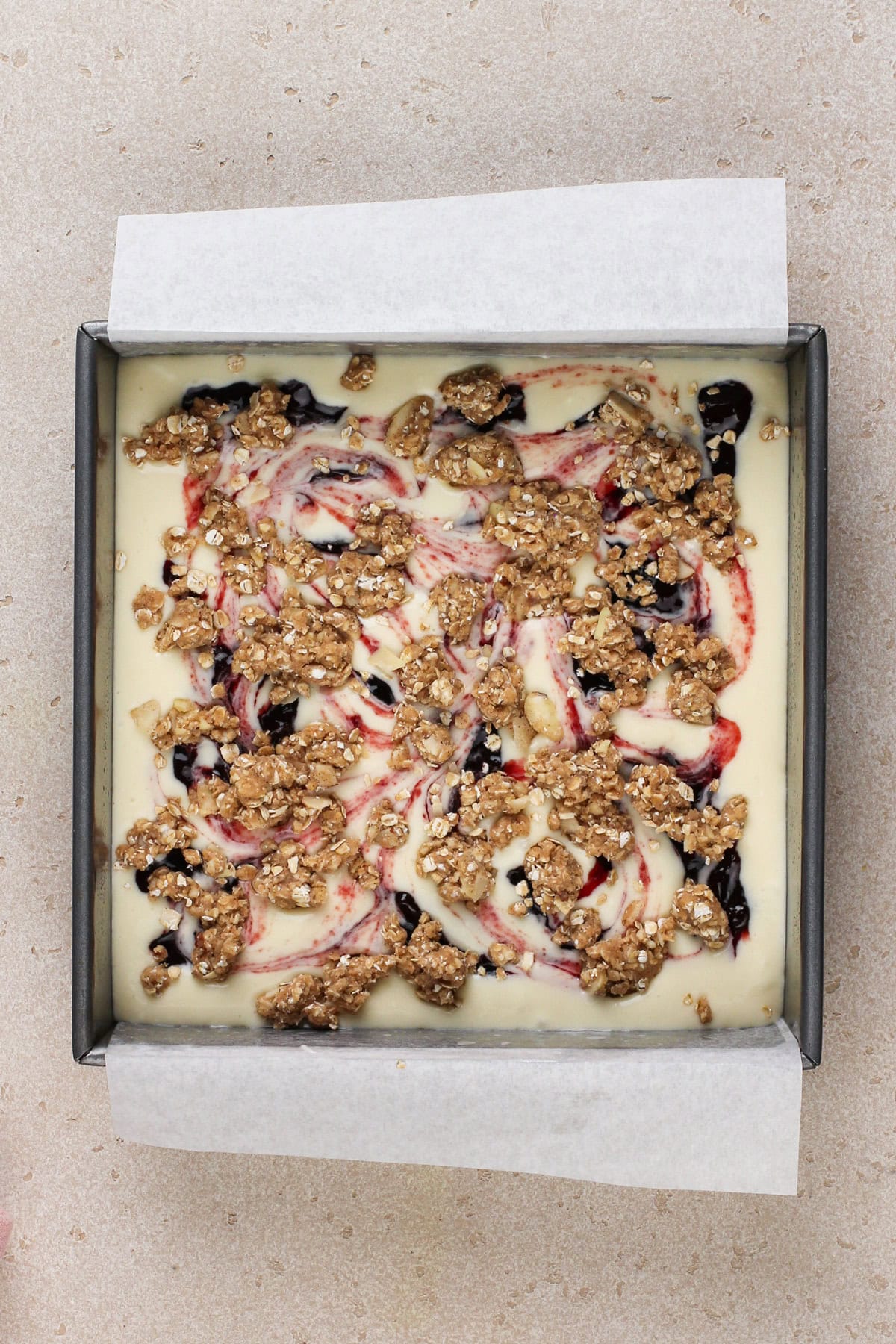 Assembled cherry cheesecake bars, ready to go in the oven.