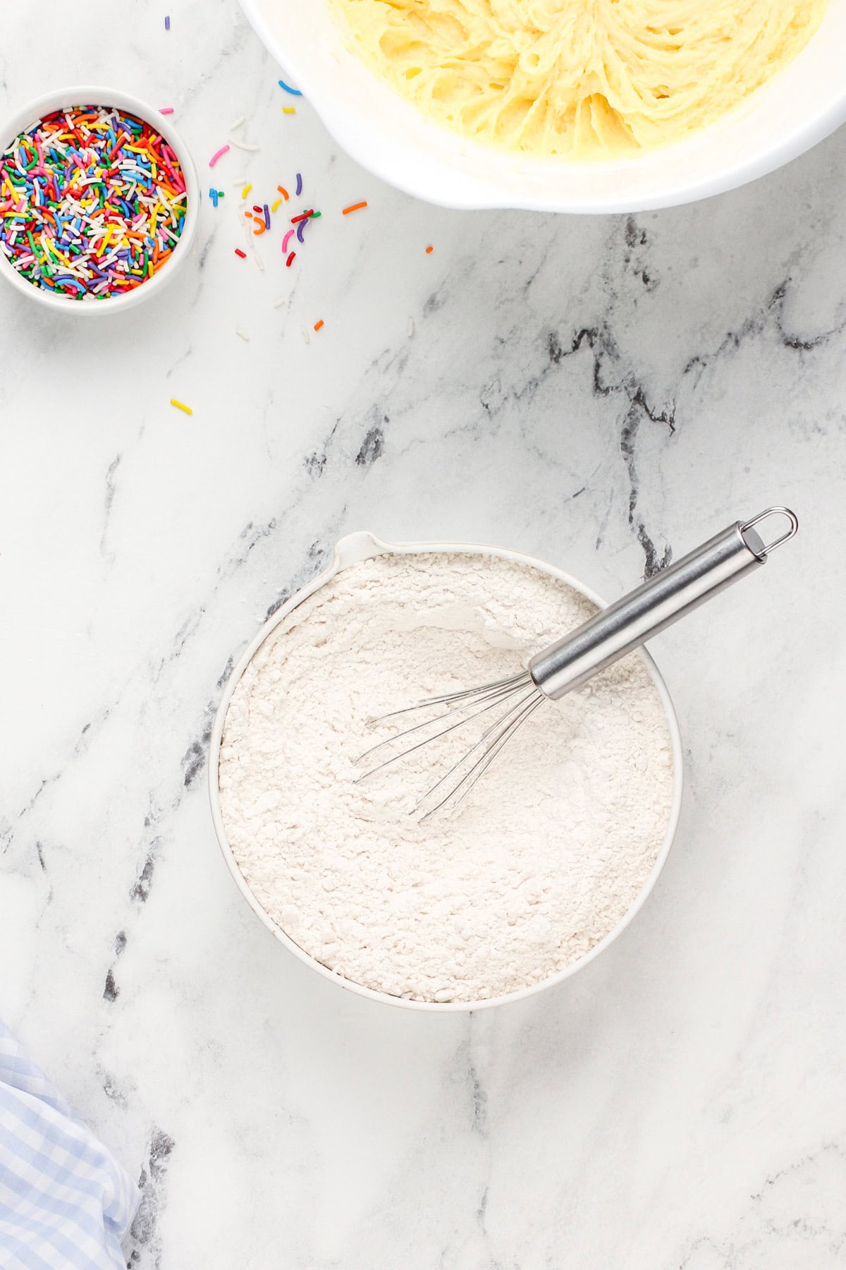 Dry ingredients for birthday cake cookies in a bowl.
