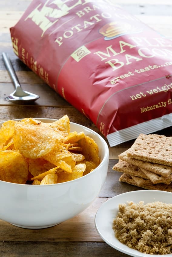Kettle Brand Maple Bacon Chips combine with graham crackers to create the perfect sweet and salty cheesecake crust. So delicious!