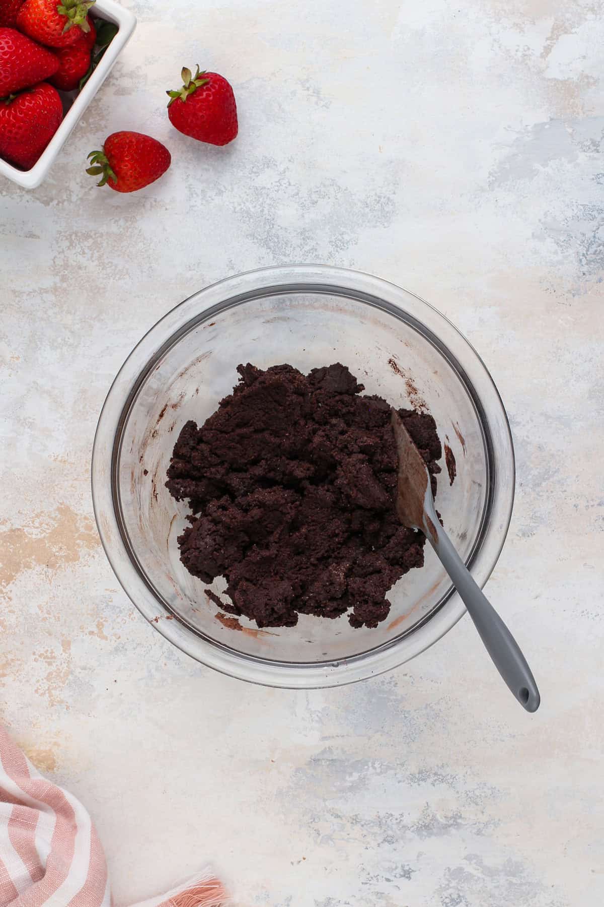 Chocolate crust dough in a bowl.