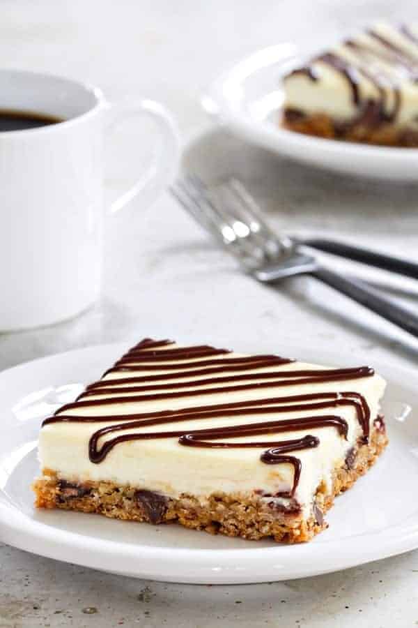 Oatmeal Chocolate Chip Cheesecake Bars have a delicious cookie crust that make them totally irresistible! You'll definitely want to make extra!