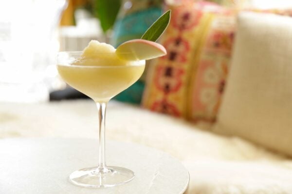 Sweet Moscato wine and juicy, fresh peaches combine to create a white wine slushy. This is the ultimate beverage for summer!