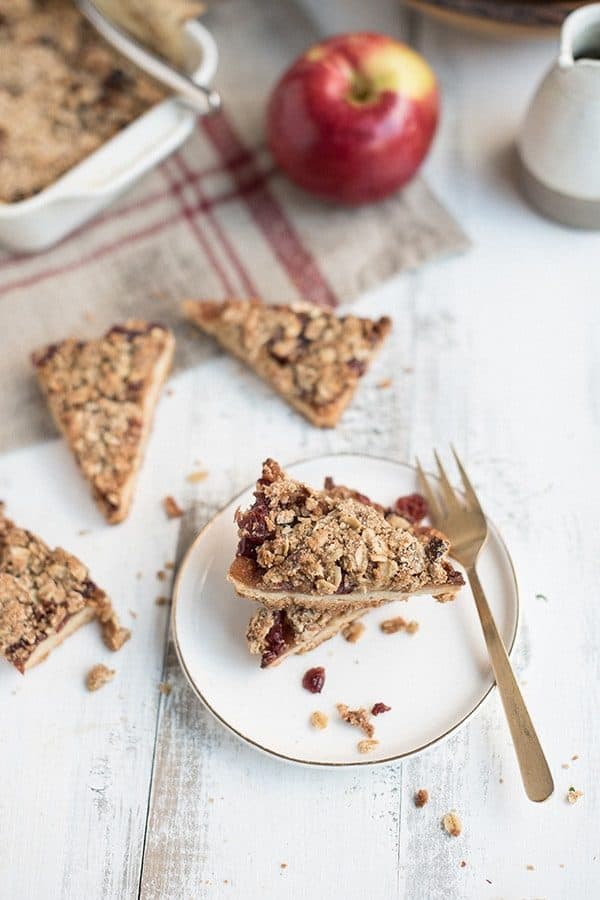 Celebrate fall with these Apple Cranberry Crumble Bars. They're sweet, crunchy and the perfect dessert after a day of apple picking.
