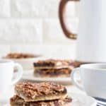 Chocolate Bourbon Pecan Bars are a fun twist on classic pecan pie. They're the perfect bar dessert for the holidays!