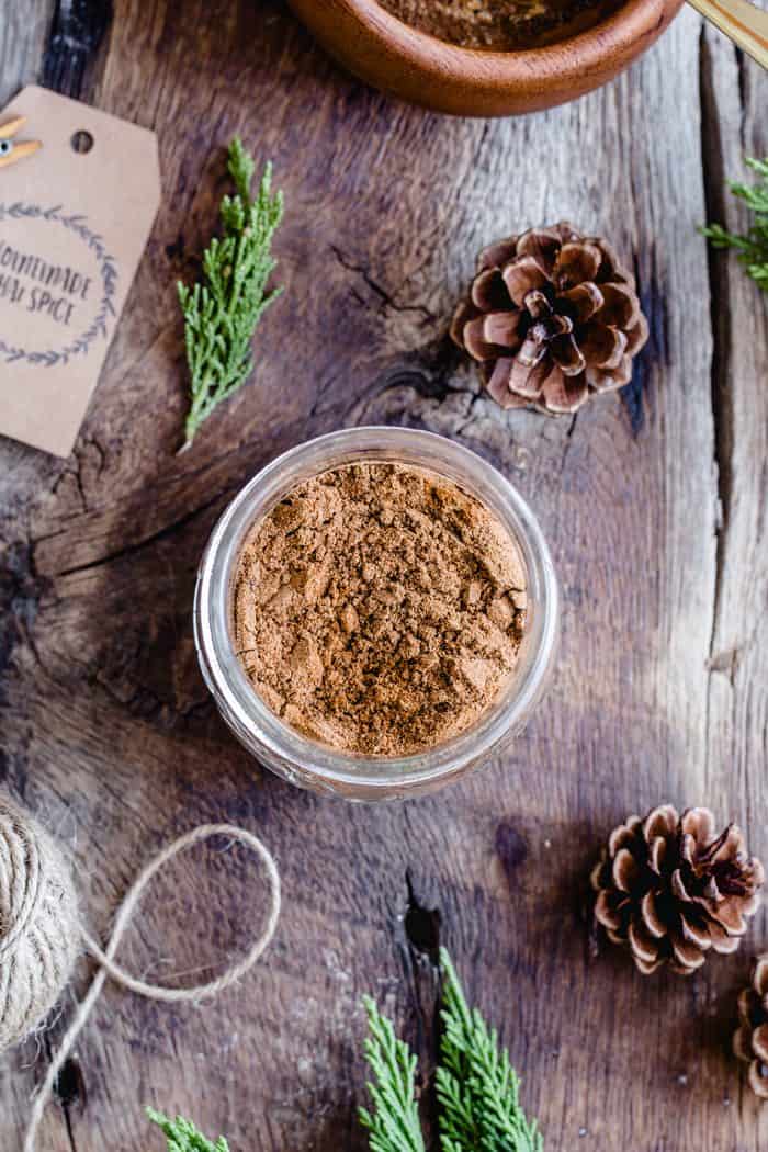 This homemade Chai Spice Blend is the perfect warm and cozy spice mixture for the holiday season. Add a cute tag, twine and little greenery for the perfect handmade hostess gift!