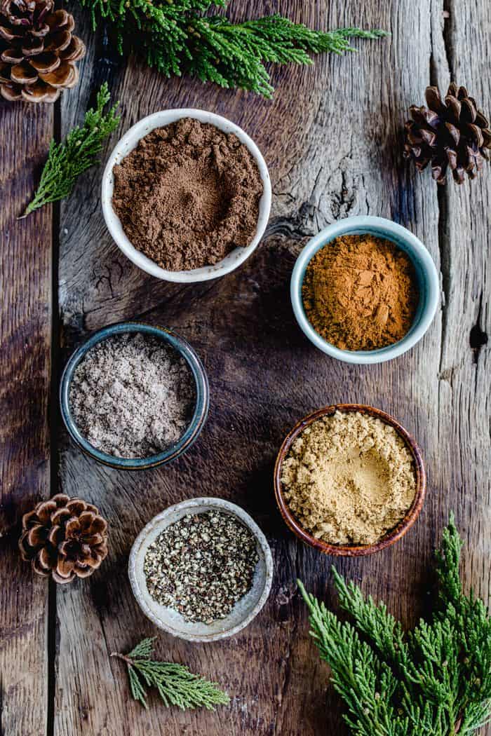 This homemade Chai Spice Blend is the perfect warm and cozy spice mixture for the holiday season. Add a cute tag and festive ribbon for the perfect DIY gift!