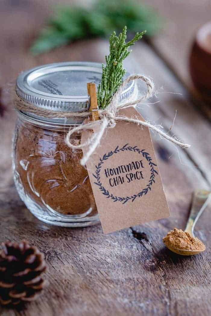 This homemade Chai Spice Blend is the perfect warm and cozy spice mixture for the holiday season. Add a cute tag, twine and little greenery for a super simple hostess gift!