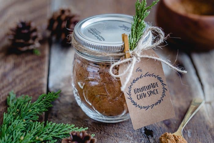 This homemade Chai Spice Blend is the perfect warm and cozy spice mixture for the holiday season. Add a cute tag, twine and little greenery an easy and thoughtful handmade gift!