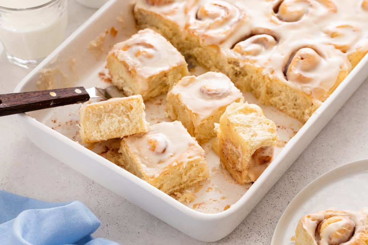 Pan of mini cinnamon rolls cut into individual rolls.