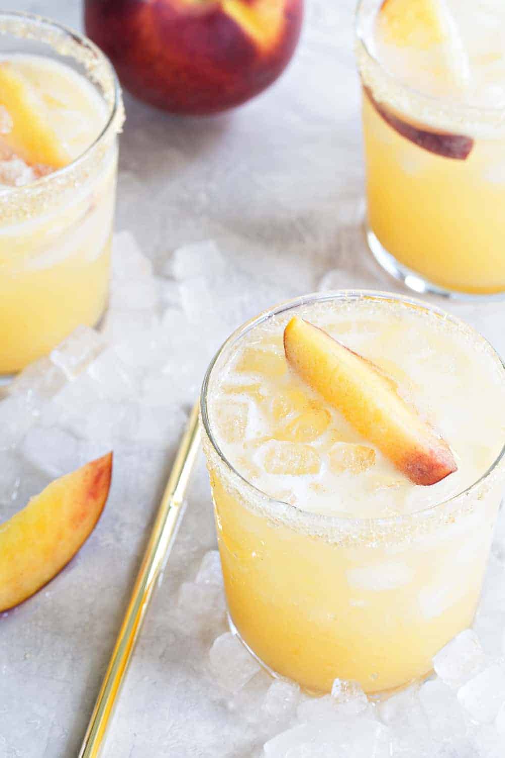 Sparkling Peach Margaritas are the perfect way to celebrate summer. Simple and delicious!