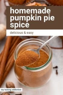 Jar of pumpkin pie spice with a spoonful of the spice balancing on the top. Text overlay includes recipe name.