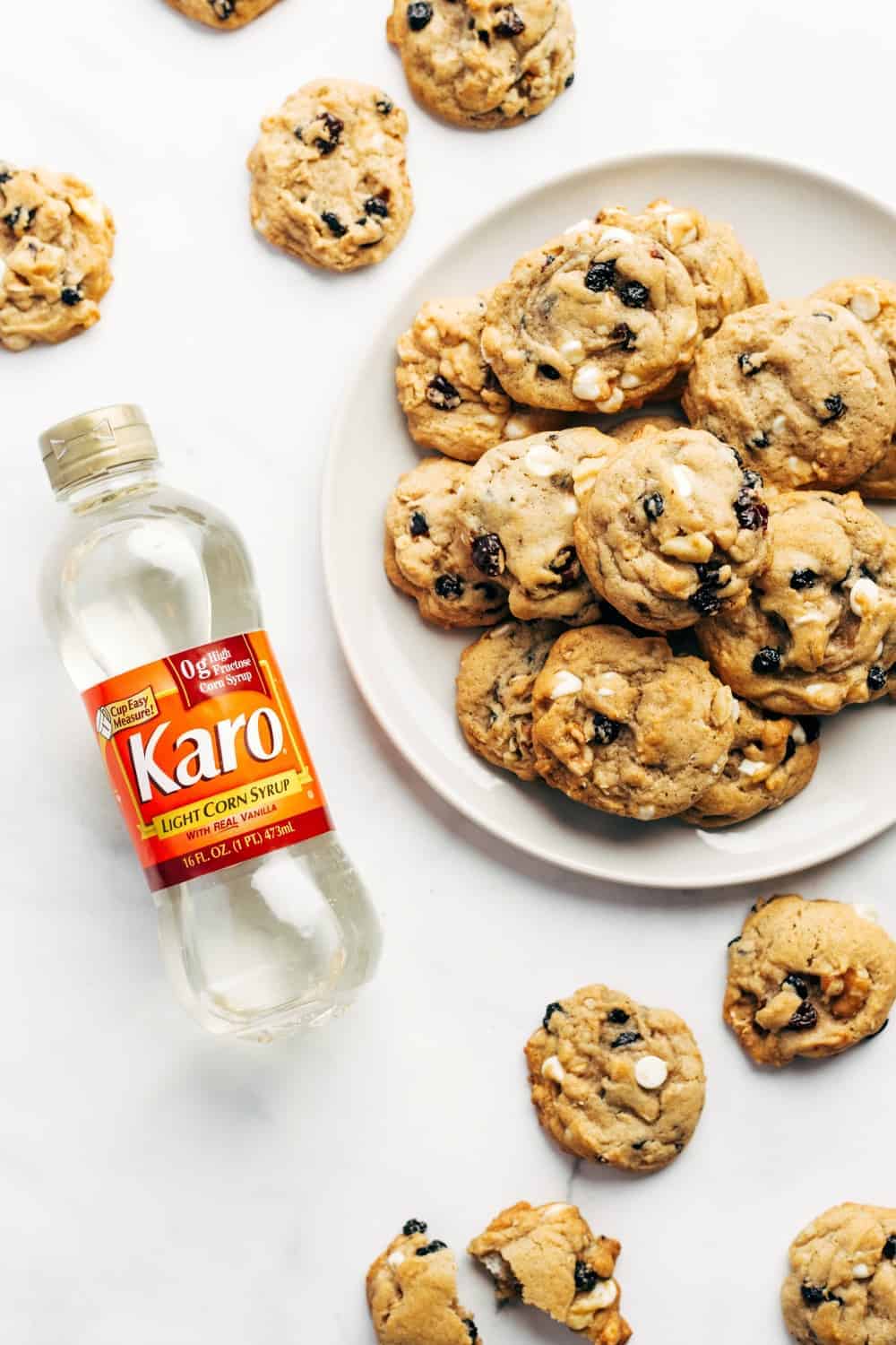 Granola Cookies are perfectly chewy and packed full of crunchy granola, dried fruit, nuts and white chocolate chips. Get creative by using your favorite mix-ins to make this Granola Cookie recipe your own!