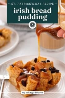 Whiskey caramel sauce being poured from a pitcher over a slice of irish bread pudding on a white plate. Text overlay includes recipe name.