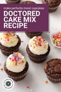 A mix of frosted and unfrosted chocolate cupcakes scattered on a countertop. Text overlay includes recipe name.