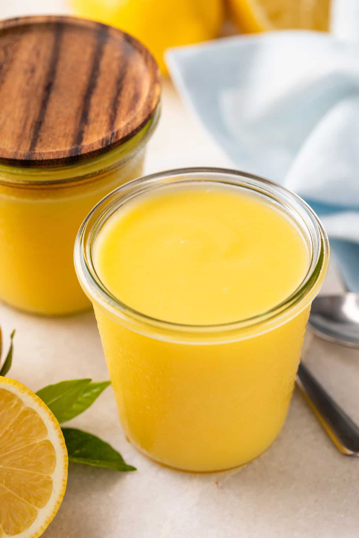 Glass jar filled with microwave lemon curd.