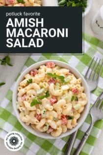 Overhead view of two small bowls of amish macaroni salad on a green and white napkin. text overlay includes recipe name.