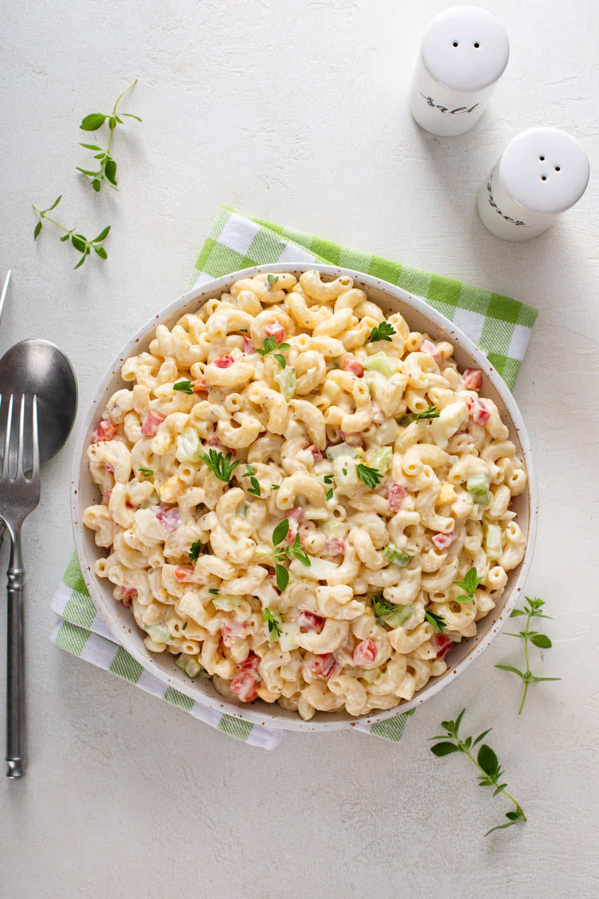 Assembled amish macaroni salad in a large serving bowl.