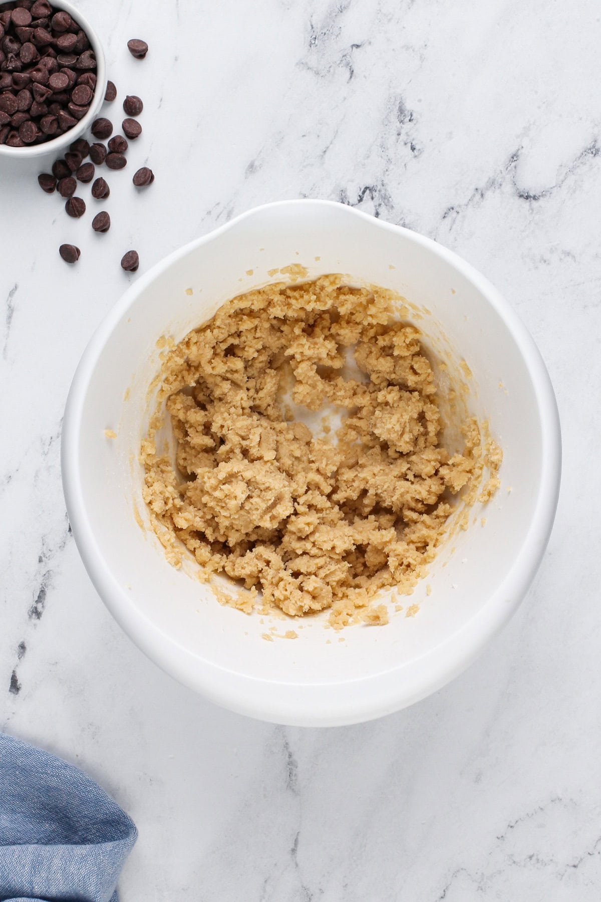 Cookie dough base mixed in a white bowl.