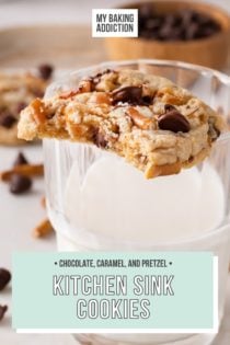 Kitchen sink cookie with a bite taken from it perched on the edge of a glass of milk. Text overlay includes recipe name.