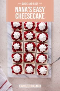 Overhead view of sliced nana's easy cheesecake on a marble board. The slices are topped with cherry pie filling and whipped topping. Text overlay includes recipe name.