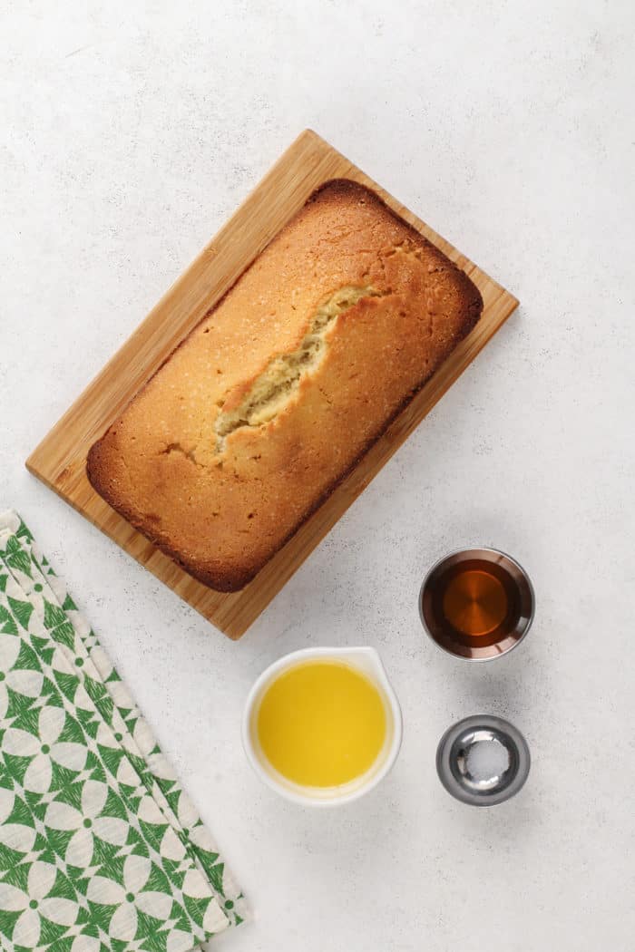 Ingredients for grilled pound cake arranged on a light-colored countertop.