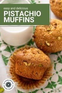 Two pistachio muffins next to a glass of milk on a green and white napkin. Text overlay includes recipe name.