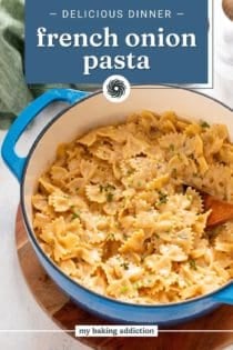 Finished french onion pasta in a blue dutch oven. Text overlay includes recipe name.