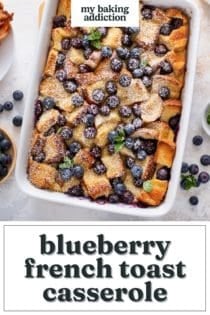 Overhead view of blueberry french toast casserole, dusted with powdered sugar in a white baking dish. Text overlay includes recipe name.