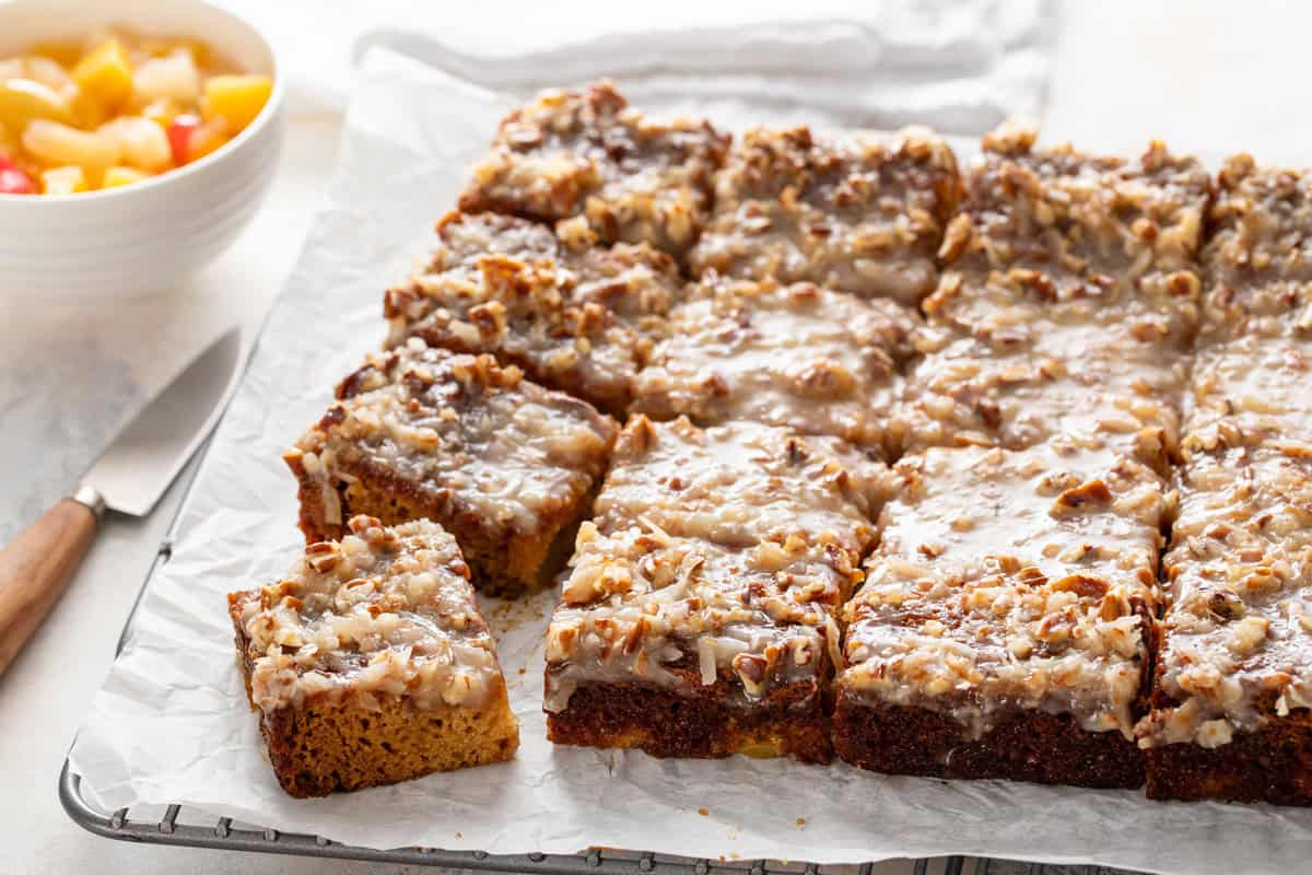 Cooled and sliced fruit cocktail cake.