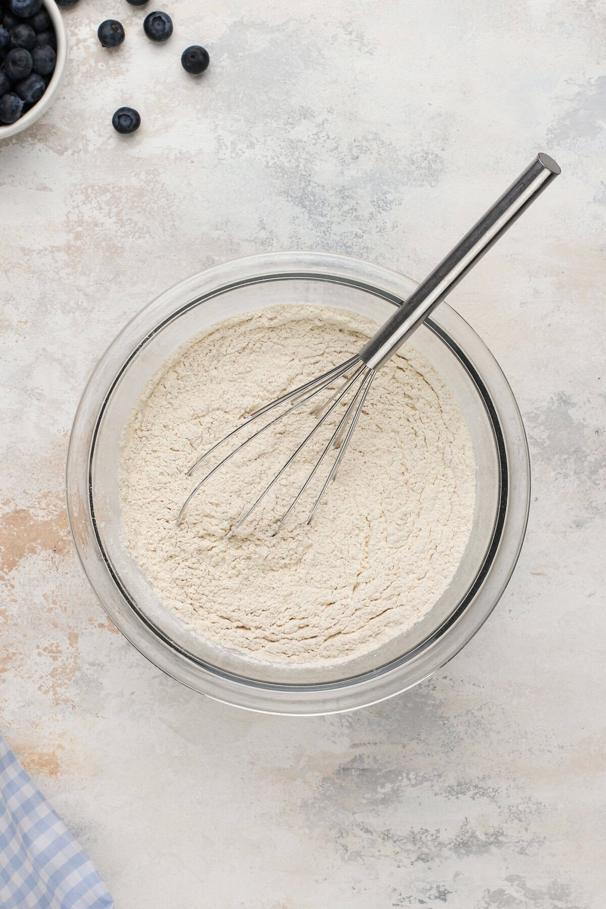 Banana bread dry ingredients whisked in a bowl.