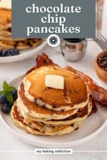Two white plates filled with stacks of chocolate chip pancakes. Text overlay includes recipe name.