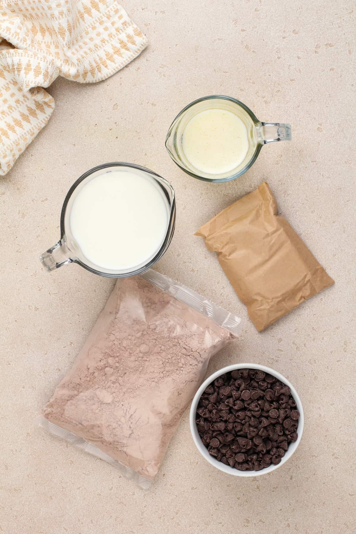 Chocolate dump cake ingredients arranged on a countertop.