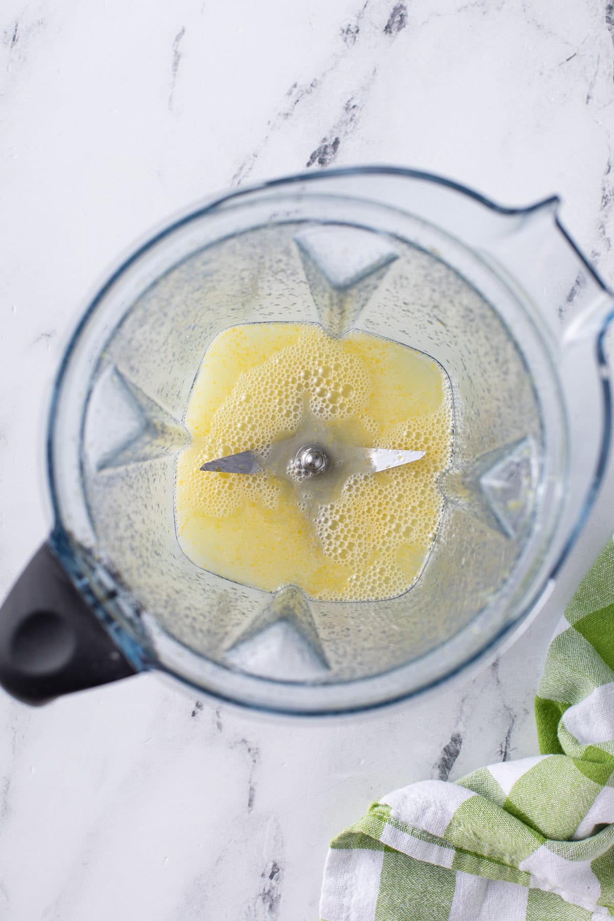 lemon juice and sugar combined in a blender.