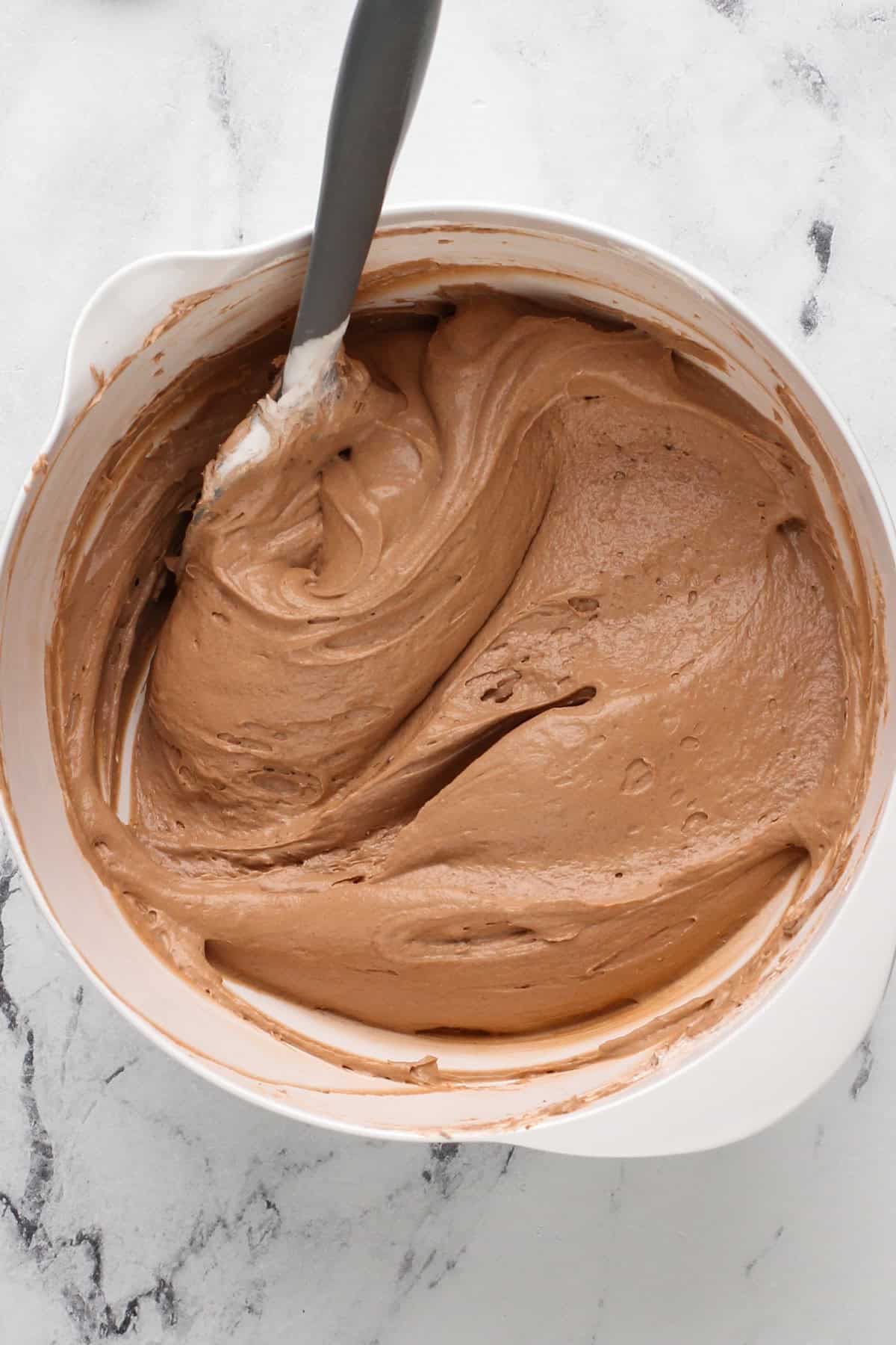 Base for oreo fluff mixed in a white bowl.