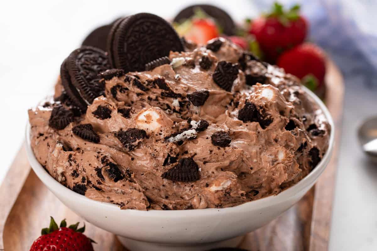 White serving bowl filled with oreo fluff.