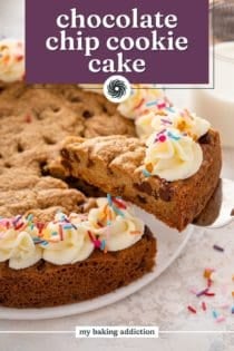 Cake server lifting up a slice of chocolate chip cookie cake. Text overlay includes recipe name.