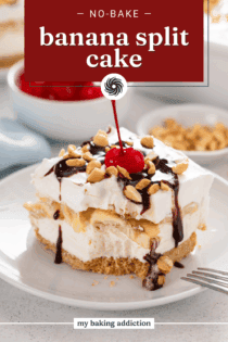 Bite taken from a corner of a slice of banana split cake. Text overlay includes recipe name.