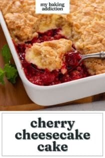 Baking dish of cherry cheesecake cake with a spoon about to serve a portion out of the corner. Text overlay includes recipe name.
