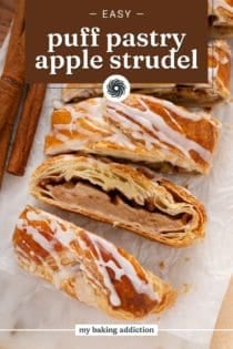 Slices of puff pastry apple strudel on a piece of parchment paper. Text overlay includes recipe name.