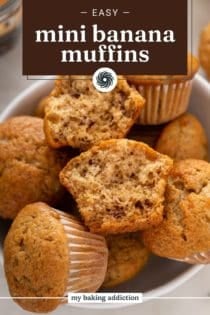 Halved mini banana muffin arranged on top of a bowl of the mini muffins. Text overlay includes recipe name.