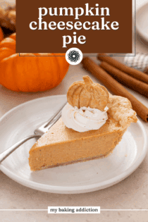 Plated slice of pumpkin cheesecake pie topped with a pumpkin-shaped cookie. Text overlay includes recipe name.