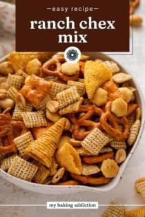 Close up of ranch chex mix in a bowl. Text overlay includes recipe name.