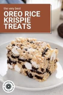 White plate holding an oreo rice krispie treat. Text overlay includes recipe name.