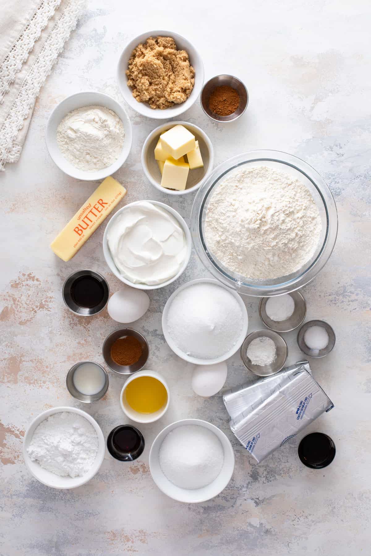 Cream cheese coffee cake ingredients arranged on a countertop.