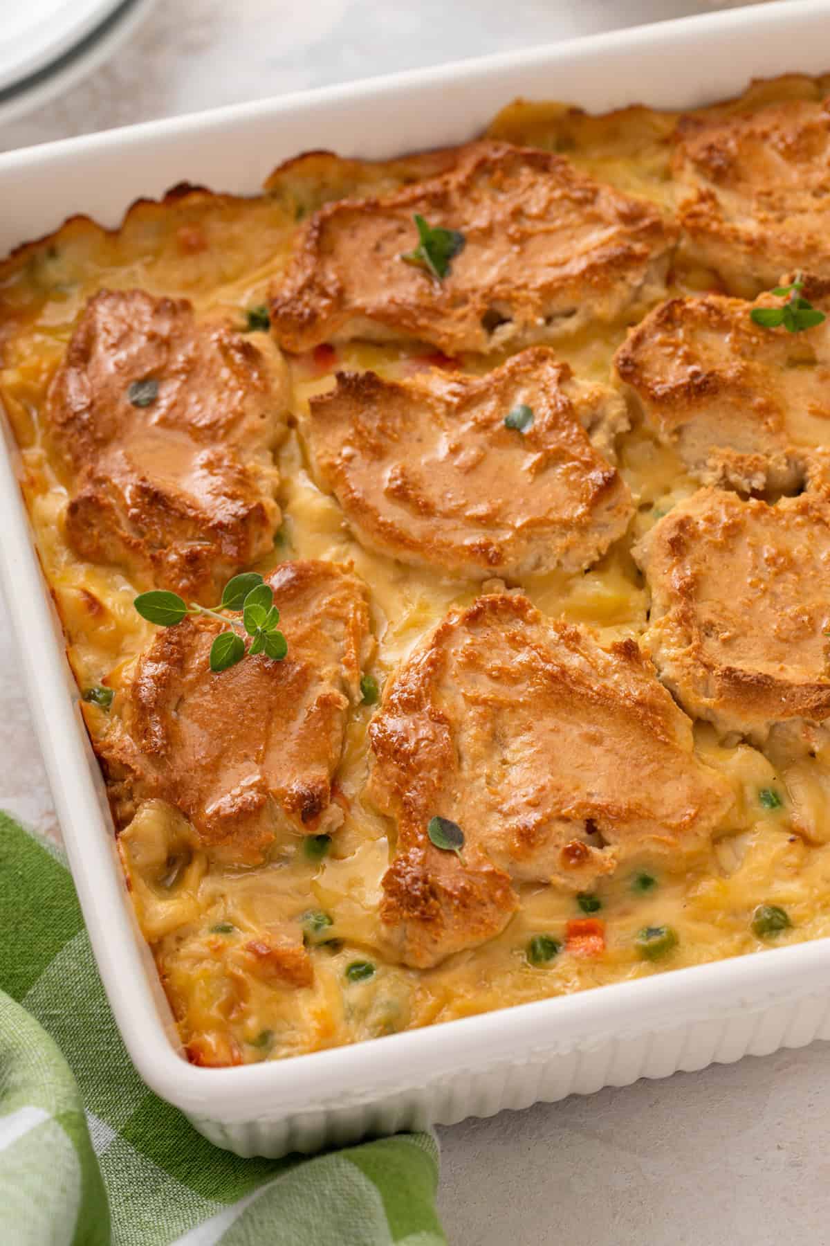 Baked bisquick chicken pot pie in a white baking dish.